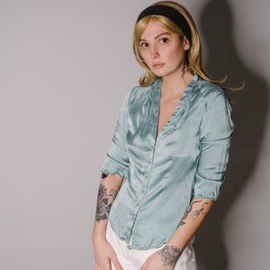 Silk blue blouse with pearl buttons